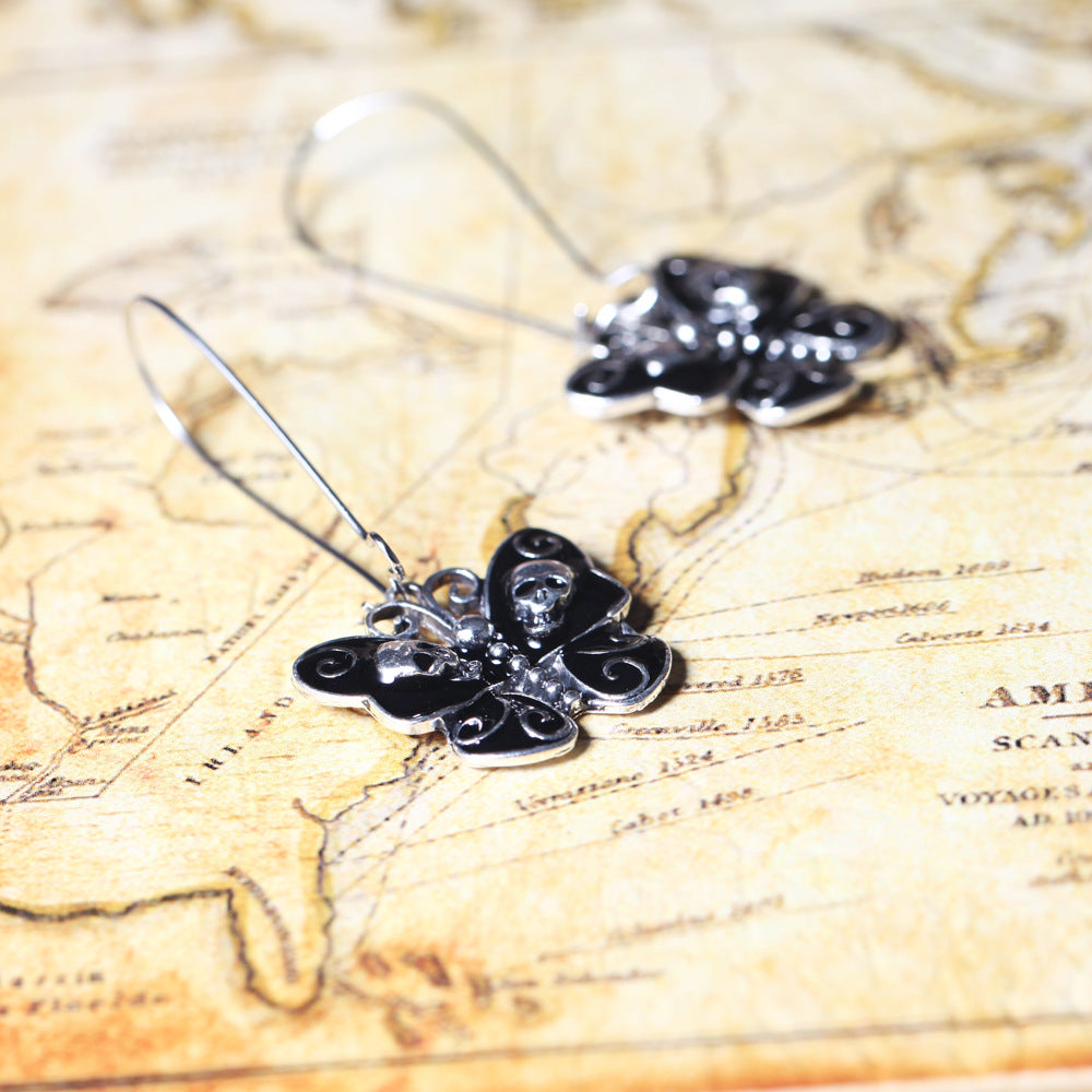 Butterfly skull earrings Angelwarriorfitness.com
