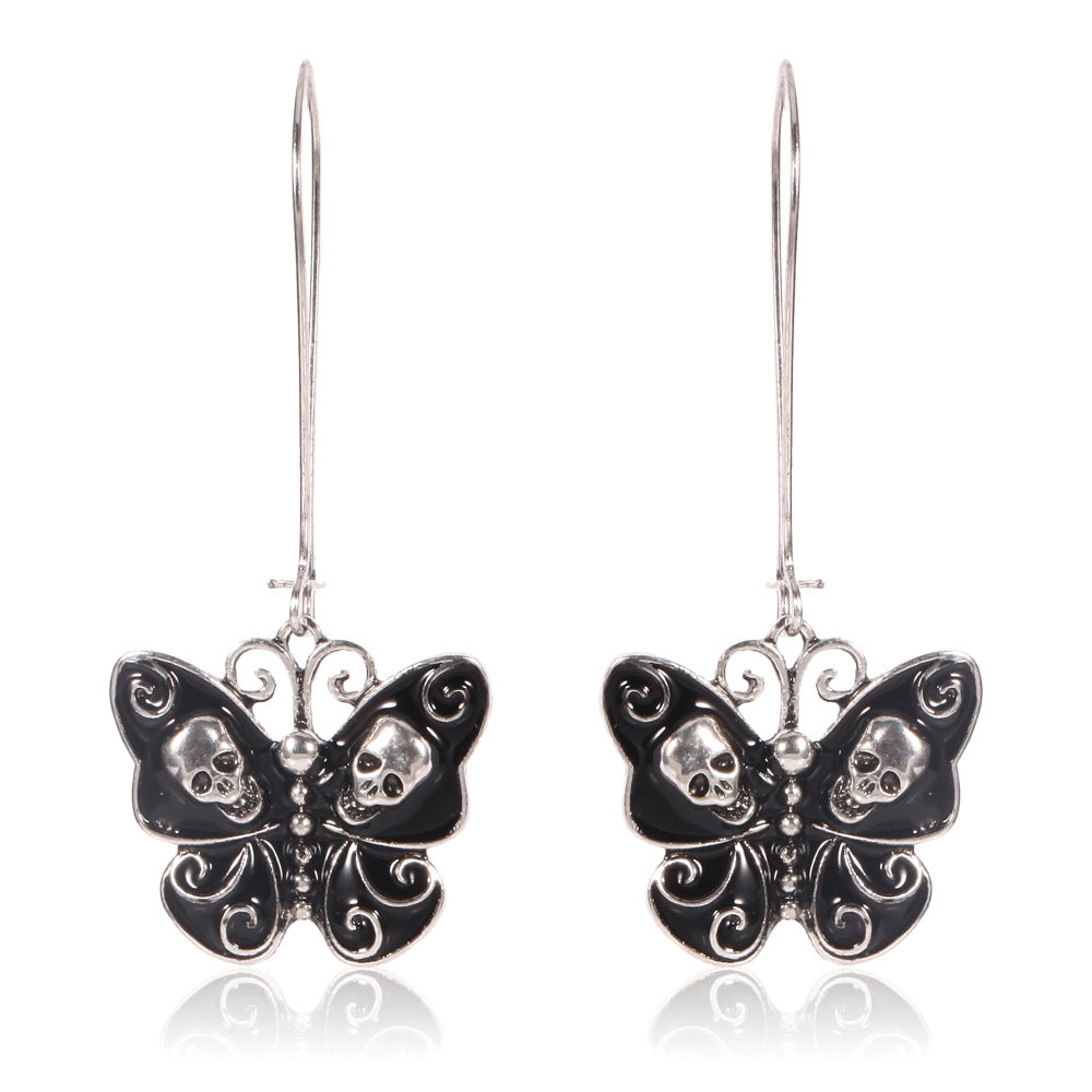 Butterfly skull earrings Angelwarriorfitness.com